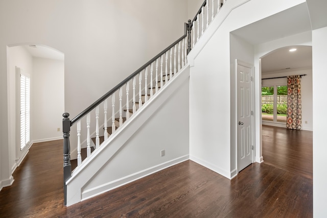 2073 W Houston Way, Collierville, TN 38139 - stairway featuring arched walkways, wood finished floors, baseboards, and recessed lighting