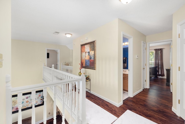 4528 Queen Sinclair Cir, Millington, TN 38053 - hallway with dark wood-style floors, an upstairs landing, and baseboards
