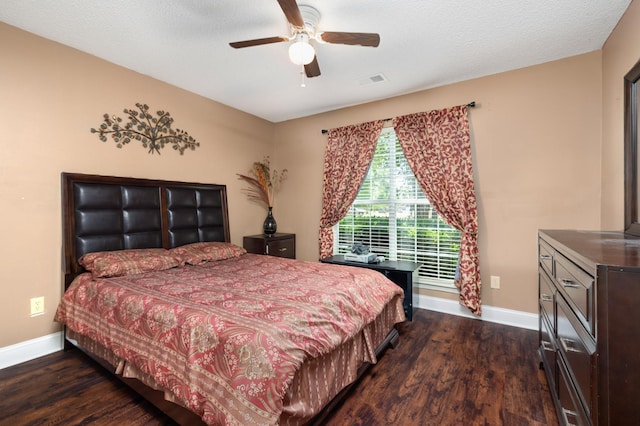 4528 Queen Sinclair Cir, Millington, TN 38053 - bedroom with dark wood-style flooring, baseboards, and a ceiling fan