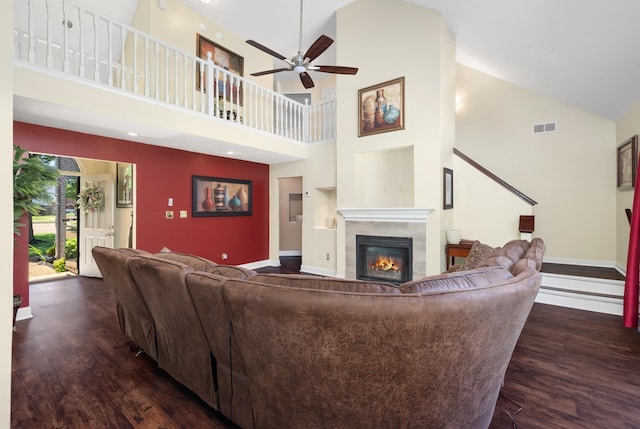 4528 Queen Sinclair Cir, Millington, TN 38053 - living room with wood finished floors, a tile fireplace, high vaulted ceiling, ceiling fan, and baseboards