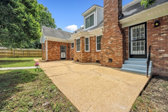 5236 Marynelle Cv, Memphis, TN 38116 - rear view of property with entry steps, brick siding, a chimney, a patio area, and roof with shingles