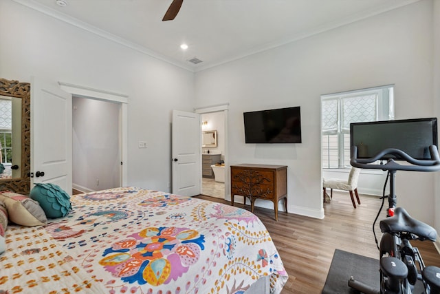 386 Ellsworth St, Memphis, TN 38111 - bedroom featuring multiple windows, light wood-style flooring, ornamental molding, baseboards, and a ceiling fan