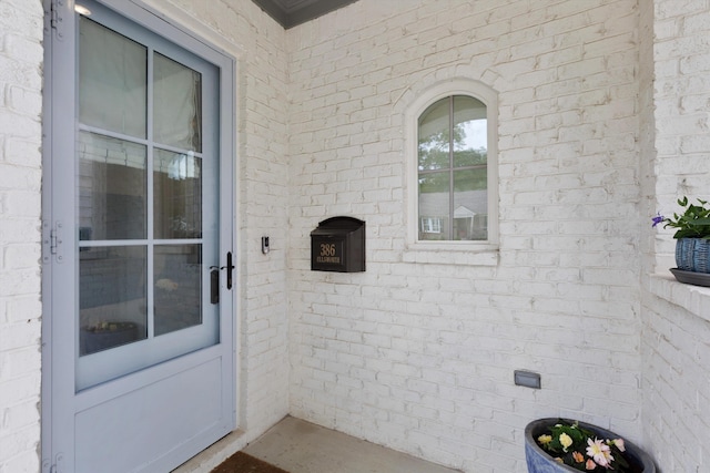 386 Ellsworth St, Memphis, TN 38111 - doorway to property featuring brick siding