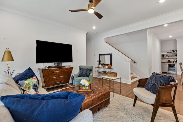 386 Ellsworth St, Memphis, TN 38111 - living area with stairway, wood finished floors, a ceiling fan, ornamental molding, and wine cooler