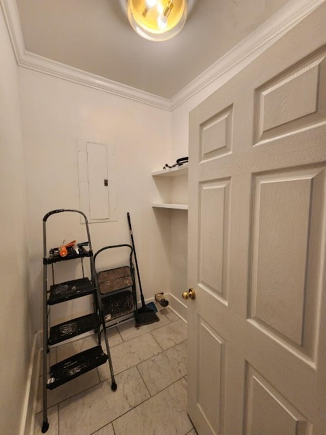 1466 Snowden Ave, Memphis, TN 38107 - laundry room with ornamental molding, electric panel, and baseboards