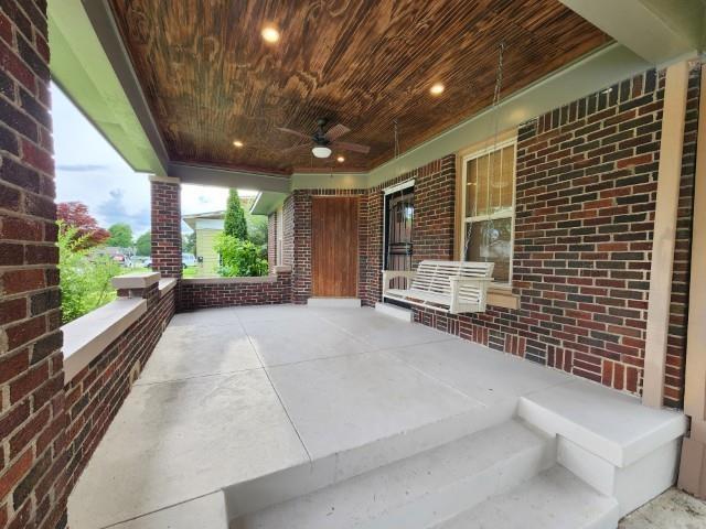 1466 Snowden Ave, Memphis, TN 38107 - covered porch featuring a ceiling fan