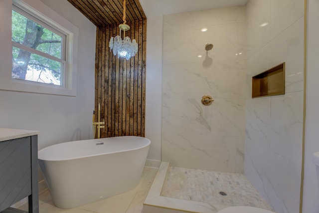 857 E Parkway St, Memphis, TN 38104 - full bath featuring a freestanding tub, a marble finish shower, and vanity