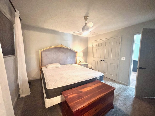 245 Holiday Hills Ln, Counce, TN 38326 - carpeted bedroom featuring baseboards, a ceiling fan, and a closet