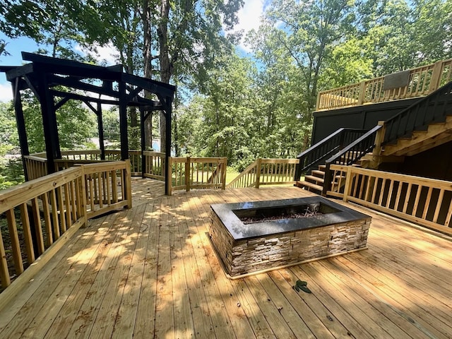 245 Holiday Hills Ln, Counce, TN 38326 - deck with an outdoor fire pit, stairway, and a gazebo