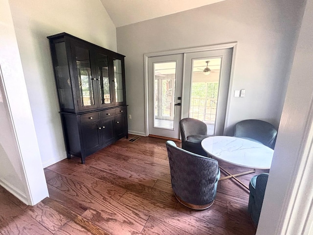 245 Holiday Hills Ln, Counce, TN 38326 - dining area with lofted ceiling, wood finished floors, and baseboards