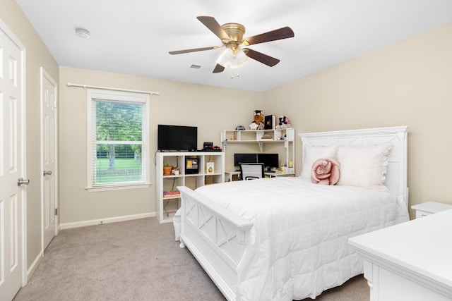 4072 Soderlund Cv, Millington, TN 38053 - bedroom featuring light colored carpet, baseboards, and ceiling fan