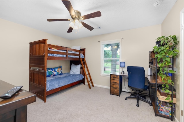 4072 Soderlund Cv, Millington, TN 38053 - carpeted bedroom with a desk, a ceiling fan, and baseboards