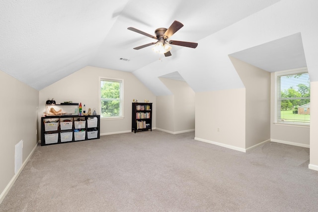 4072 Soderlund Cv, Millington, TN 38053 - additional living space featuring carpet floors, plenty of natural light, lofted ceiling, and baseboards