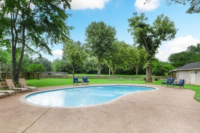 4072 Soderlund Cv, Millington, TN 38053 - view of pool featuring a patio area and view of wooded area