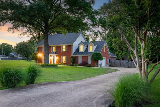 4072 Soderlund Cv, Millington, TN 38053 - view of front of home featuring a garage, concrete driveway, and brick siding