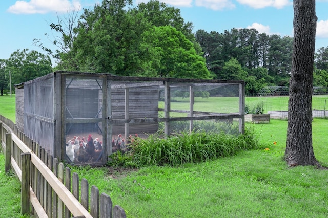 4072 Soderlund Cv, Millington, TN 38053 - view of yard featuring exterior structure and an outdoor structure