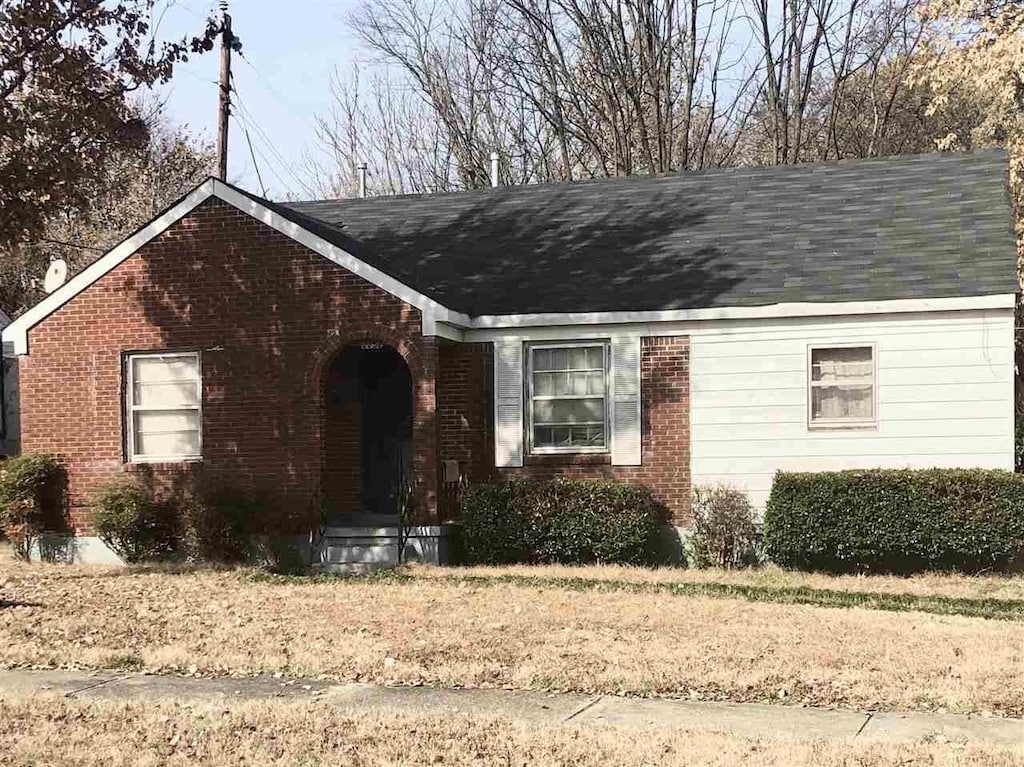 2252 Devoy St, Memphis, TN 38108 - view of front of house featuring brick siding and a shingled roof