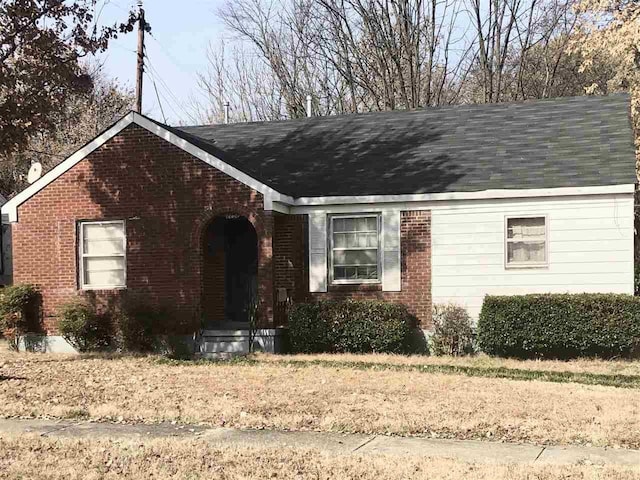 2252 Devoy St, Memphis, TN 38108 - view of front of house featuring brick siding and a shingled roof