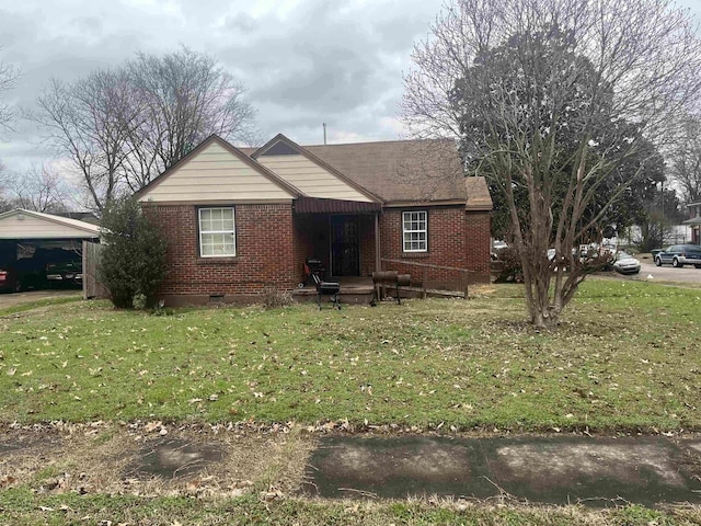 2320 Devoy St, Memphis, TN 38108 - ranch-style home featuring brick siding, a front yard, and crawl space