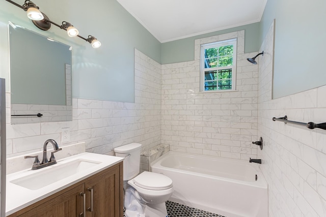 1906 Vollintine Ave, Memphis, TN 38107 - full bath with tile walls, toilet, crown molding, vanity, and shower / washtub combination