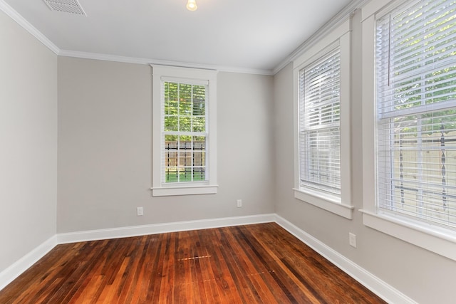 1906 Vollintine Ave, Memphis, TN 38107 - unfurnished room with dark wood-style floors, baseboards, and ornamental molding