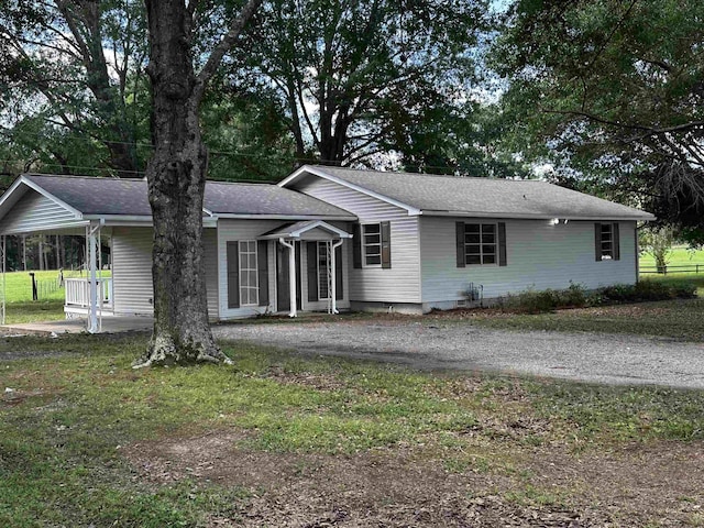 215 Pinecrest Ln, Middleton, TN 38052 - single story home with gravel driveway