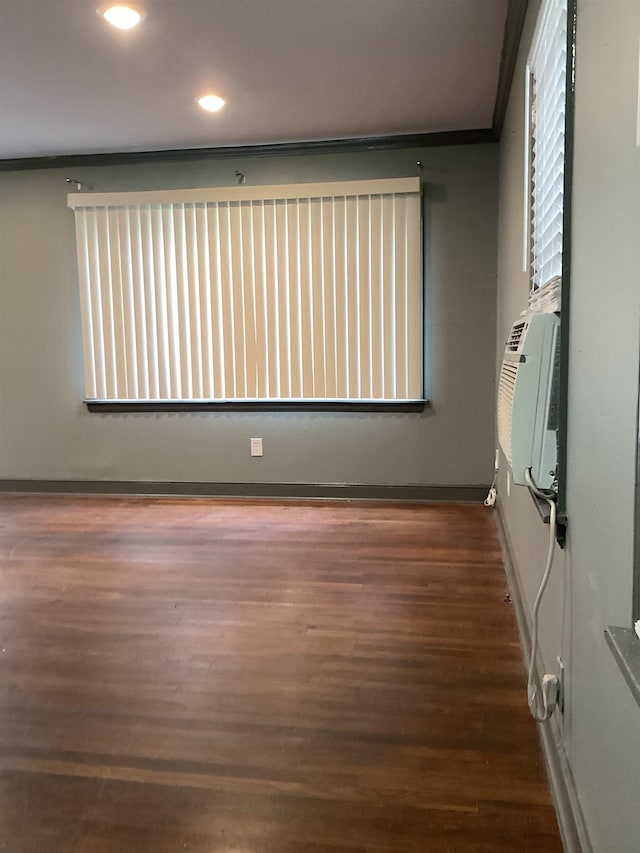 4864 Bowen Ave, Memphis, TN 38122 - empty room featuring wood finished floors, crown molding, recessed lighting, and baseboards
