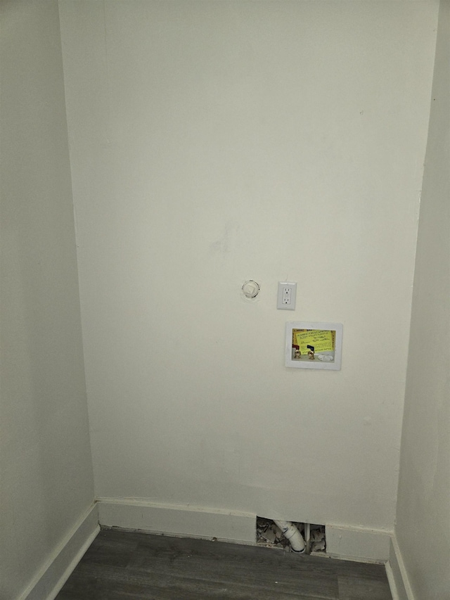 961 Joseph Pl, Memphis, TN 38107 - laundry room featuring baseboards, washer hookup, and dark wood-type flooring
