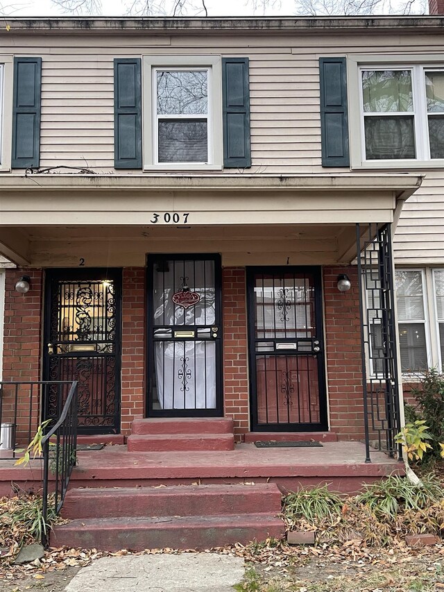 3007 Walnut Grove Rd Unit 1, Memphis, TN 38111 - entrance to property with brick siding and a porch