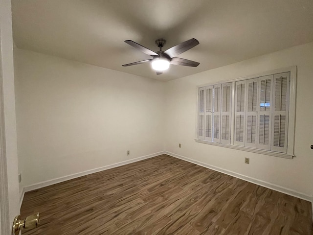 3007 Walnut Grove Rd Unit 1, Memphis, TN 38111 - spare room featuring dark wood-type flooring, a ceiling fan, and baseboards