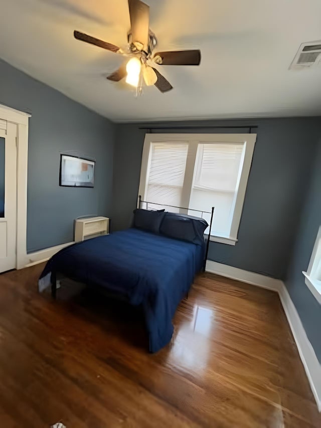929 N Watkins St, Memphis, TN 38107 - bedroom featuring wood finished floors, baseboards, and ceiling fan