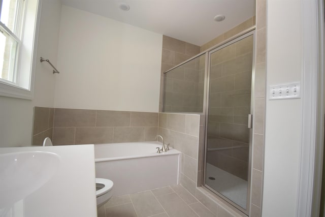117 Centerline Roper Loop, Byhalia, MS 38611 - bathroom with a garden tub, tile patterned flooring, toilet, and a shower stall