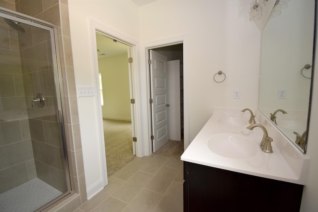 117 Centerline Roper Loop, Byhalia, MS 38611 - bathroom featuring double vanity, a stall shower, and tile patterned floors