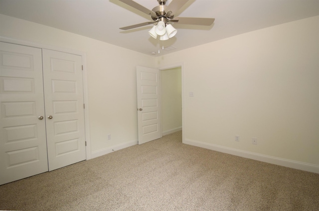 117 Centerline Roper Loop, Byhalia, MS 38611 - unfurnished bedroom featuring light colored carpet, baseboards, a closet, and ceiling fan