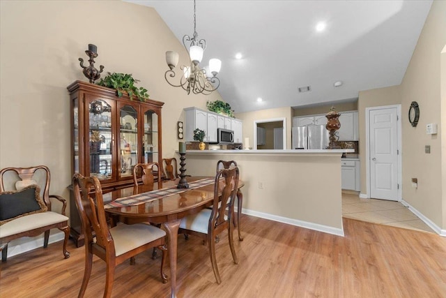 1961 Appling Oaks Cir Unit 29, Cordova, TN 38016 - dining area with vaulted ceiling, a chandelier, light wood-style floors, baseboards, and recessed lighting