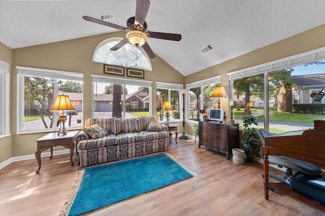 1961 Appling Oaks Cir Unit 29, Cordova, TN 38016 - sunroom / solarium with a textured ceiling, wood finished floors, high vaulted ceiling, baseboards, and a wooden deck