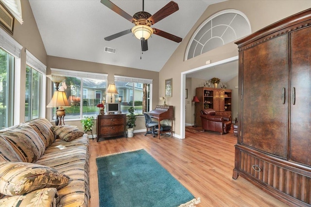 1961 Appling Oaks Cir Unit 29, Cordova, TN 38016 - living area featuring a ceiling fan, light wood-style flooring, plenty of natural light, high vaulted ceiling, and baseboards