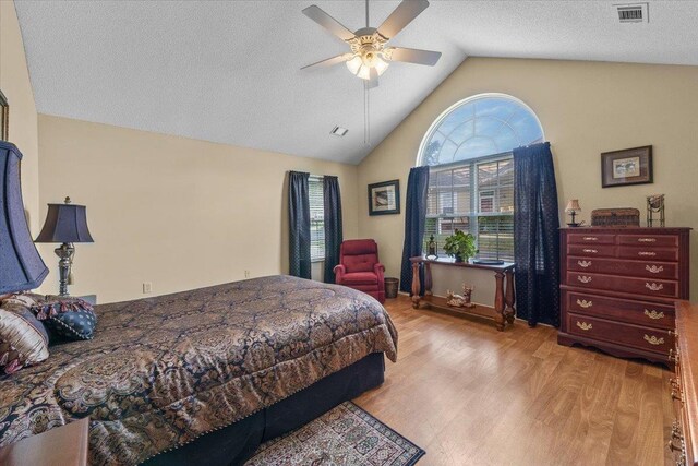 1961 Appling Oaks Cir Unit 29, Cordova, TN 38016 - bedroom with wood finished floors, a ceiling fan, and high vaulted ceiling