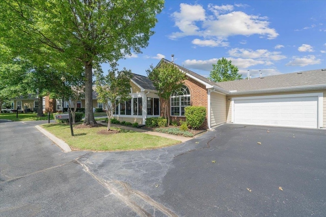 1961 Appling Oaks Cir Unit 29, Cordova, TN 38016 - single story home with driveway, brick siding, and a garage