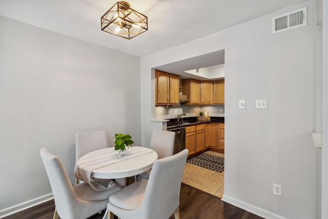 1819 Crossflower Cv Unit 85, Germantown, TN 38138 - dining area with baseboards and dark wood-style floors