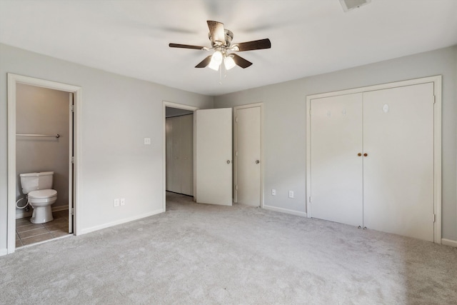 1819 Crossflower Cv Unit 85, Germantown, TN 38138 - unfurnished bedroom with two closets, carpet, ensuite bathroom, and baseboards