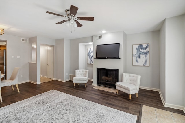 1819 Crossflower Cv Unit 85, Germantown, TN 38138 - living area with a fireplace with flush hearth, a ceiling fan, baseboards, wood finished floors, and recessed lighting