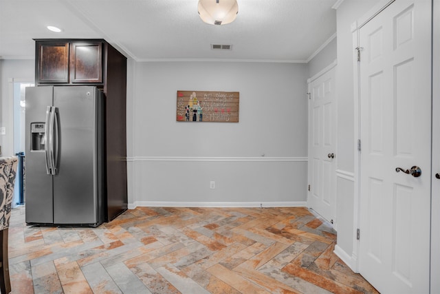 4951 Lynbar Ave, Memphis, TN 38117 - kitchen featuring stainless steel fridge with ice dispenser, ornamental molding, dark brown cabinetry, and baseboards