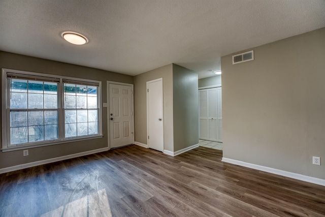 5432 Burton Church Cv Unit 5432, Bartlett, TN 38134 - entryway featuring baseboards, wood finished floors, and a textured ceiling
