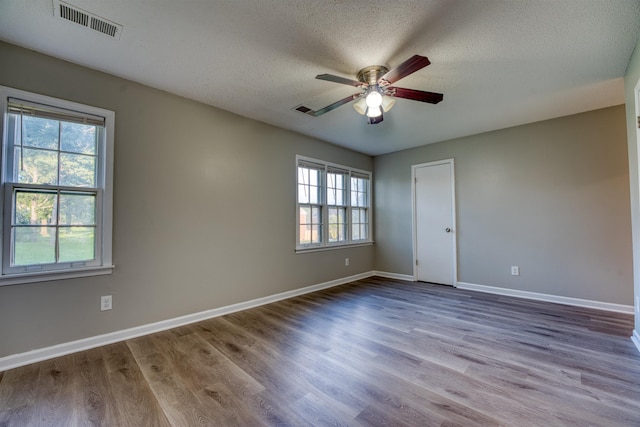 5432 Burton Church Cv Unit 5432, Bartlett, TN 38134 - spare room featuring a ceiling fan, a textured ceiling, wood finished floors, and baseboards