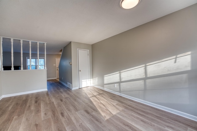 5432 Burton Church Cv Unit 5432, Bartlett, TN 38134 - empty room with wood finished floors and baseboards