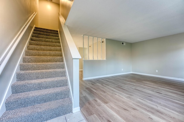 5432 Burton Church Cv Unit 5432, Bartlett, TN 38134 - stairs with wood finished floors and baseboards