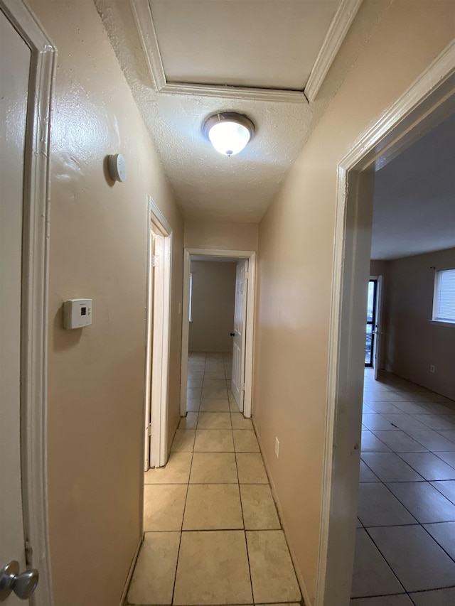 2284 Norman Ave, Memphis, TN 38108 - hall featuring light tile patterned floors and a textured ceiling
