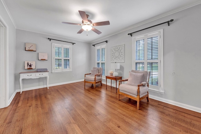 5238 Peg Ln, Memphis, TN 38117 - sitting room with plenty of natural light, crown molding, wood finished floors, and a ceiling fan