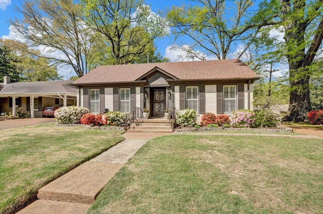 5238 Peg Ln, Memphis, TN 38117 - single story home featuring brick siding and a front lawn